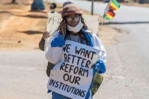 Leading novelist Tsitsi Dangarembga was arrested after she held up an anti-corruption placard by the roadside. By ZINYANGE AUNTONY (AFP)