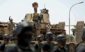 Libyan special forces trained by the Turkish military gather at a training camp in the coastal city al-Khums, east of the capital Tripoli, on August 15, during a visit by members of the country's presidential council. By Mahmud TURKIA (AFP/File)
