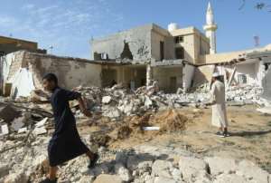 Libya's elections are part of a UN-backed process that has brought relative peace after years of turmoil, including an air strike on the outskirts of Tripoli where damage is pictured on October 14, 2019. By Mahmud TURKIA (AFP)