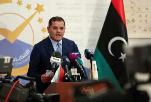 Libya's interim Prime Minister Abdulhamid Dbeibah speaks after registering his candidacy in November for the presidential election. By Mahmud TURKIA (AFP)