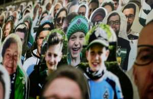 Life-sized images of fans have been placed at Borussia Moenchegladbach's stadium. By Ina FASSBENDER (AFP)