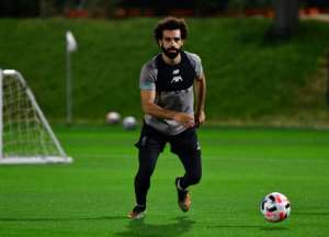 Liverpool's Mo Salah is on form going intio the Club World Cup. By Giuseppe CACACE (AFP)