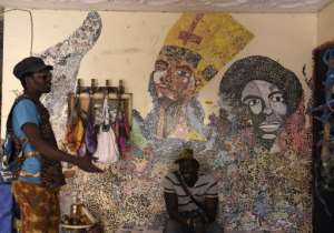 Mamadou Boye Diallo((L), the founder of the Yataal Art fair, is also a local guide. By SEYLLOU (AFP)
