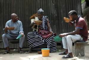 Many Nigerians prefer the taste -- and price -- of burukutu over industrially-made beer. But others are deterred by quality control and hygiene standards. By Kola Sulaimon (AFP)