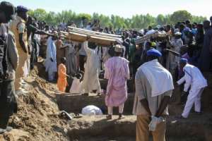 Many of the dead were seasonal labourers who came to work the rice fields. By Audu Marte (AFP)