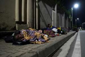 Many families slept on pavements surrounded by their belongings. By Simon Wohlfahrt (AFP)