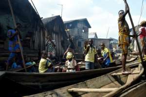 Many in Lagos' coastal community of Makoko were living poverty before the pandemic started. By PIUS UTOMI EKPEI (AFP)