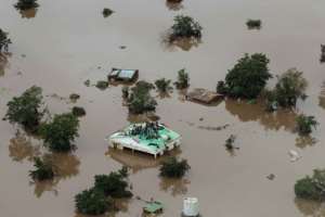 Many people in the Beira region fled for their lives or took to the rooftops as the floodwaters rose. By Rick Emenaket (Mission Aviation Fellowship/AFP)