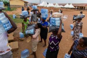 Many people in Lagos survive by hawking or doing manual labour, and the order to stay at home has crippled their income. By Benson IBEABUCHI (AFP)