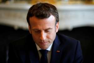 Macron provoked disappointment among the survivors of the genocide by refusing an invitation to attend the genocide commemorations this weekend in Rwanda. By PHILIPPE WOJAZER (POOL / AFP)