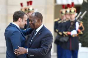 Macron (L) will also meet again with his Ivory Coast counterpart Alassane Ouattara. By GERARD JULIEN (AFP)