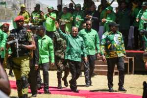 Magufuli touts his expansion of free education, rural electrification and infrastructure projects. By ERICKY BONIPHACE (AFP/File)