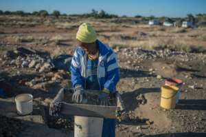 Maitse, a mother of 11, turned to illegal mining to provide for her nine grandchildren after three of her daughters died. By MUJAHID SAFODIEN (AFP)