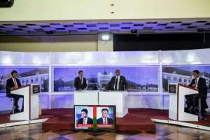 Malagasy Presidential candidate Marc Ravalomanana (R) and Presidential candidate Andry Rajoelina (L) took part in a public debate at the Malagasy Public broadcaster.  By GIANLUIGI GUERCIA (AFP/File)