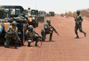 Malian soldiers are among those trying to counter the increasingly bold attacks of jihadists in the Sahel region. By PHILIPPE DESMAZES (AFP)