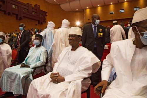 Mali's new prime minister Choguel Maiga, centre, looks on at President Colonel Assimi Goita's inauguration ceremony.  By ANNIE RISEMBERG (AFP)