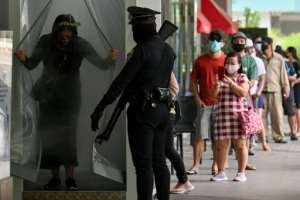 Malls opened in the Philippines' capital Manila on Saturday. By Ted ALJIBE (AFP)
