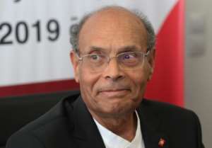 Marzouki shown in August 2019 when he submitted his candidacy for early presidential elections. By HASNA (AFP/File)