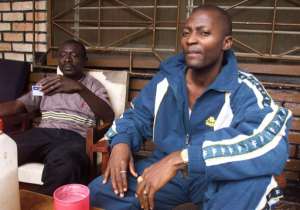 Massaquoi (right), seen here when he was spokesperson for the RUF (Revolutionary United Front) in 2001. By GEORGES GOBET (AFP)