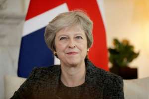 May will be joined by several ministers and 29 business representatives from various industries on her trip.  By Matt Dunham (POOL/AFP/File)