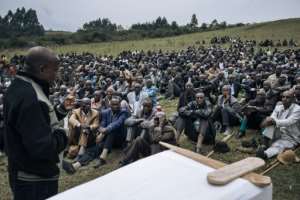 Minembwe's mayor speaks at the funeral. By ALEXIS HUGUET (AFP)