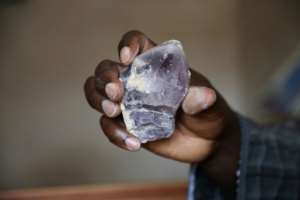 Miners have been forced to share profits and carry out the bidding of the armed groups in order to continue their trade. By Kola Sulaimon (AFP)