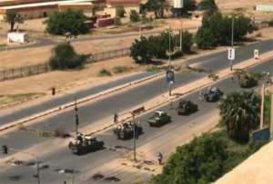 Military vehicles have deployed in the Sudanese capital Khartoum. By - (Anonymous/ESN/AFP)