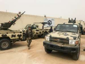 Militiamen from eastern Libya claim to have seized vehicles belonging to Haftar's forces. By Mahmud TURKIA (AFP)