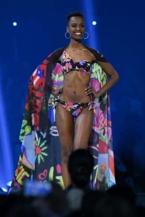 Miss South Africa Zozibini Tunzi competes in the swimsuit category during the 2019 Miss Universe competition, a controversial segment of the pageant. By VALERIE MACON (AFP)