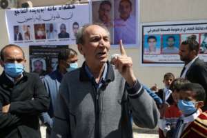 Mohamed Amer's son Moaid was killed by the militia. By Mahmud Turkia (AFP)