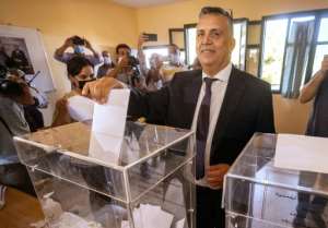 Moroccam Abdellatif Ouahbi, the president of the Authenticity and Modernity party, casts his ballot in Rabat. By FADEL SENNA (AFP)