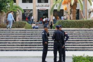Moroccan security forces stand guard outside a court during the trial of Hajar Raissouni, a Moroccan journalist of the daily newspaper Akhbar El-Youm, who was on Monday sentenced to a year in prison for an illegal abortion. By - (AFP)
