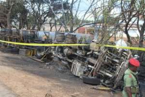 Motorbike taxis were damaged by the force of the fuel tanker blast in Tanzania. By STRINGER (AFP)