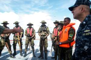 Mozambican troops trained with the US Navy at the naval base of Pemba in February last year. By EMIDIO JOSINE (AFP)