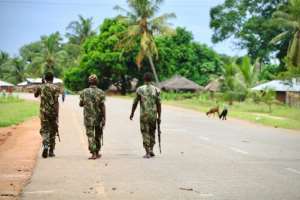 Mozambique soldiers patrol the northern town of Mocimboa da Praia. Researchers say the army has hired private military contractors in its efforts to stem attacks. By ADRIEN BARBIER (AFP/File)