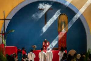Mozambique was hit by Cycline Idai in March, but a month later worshippers continued to gather at this church in Barrio Manasse. By Zinyange AUNTONY (AFP/File)
