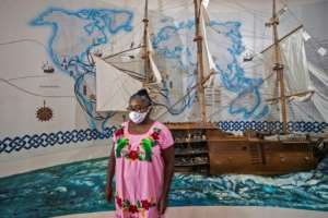Museum guide Angelica Sorrosa believes it's important that future generations know about Afro-Mexican history. By PEDRO PARDO (AFP)