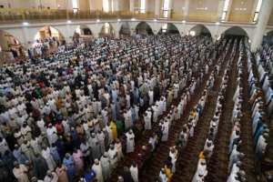 Muslim faithful at Friday prayers in the National Mosque in Abuja, Nigeria's capital. By Kola Sulaimon (AFP)