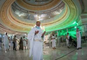 Muslims perform the Umrah in the Grand Mosque complex in the holy city of Mecca, after Saudi authorities partially resumed the year-round pilgrimage with extensive health precautions imposed after a seven-month coronavirus hiatus. By - (Saudi Ministry of Hajj and Umra/AFP)