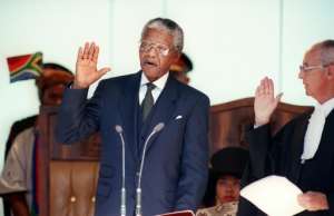 Nelson Mandela was sworn in as the first black president of South Africa in May 1994. By WALTER DHLADHLA (AFP)