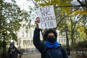 New York City has closed schools, but opened a debate about why bars and gyms are still allowed to operate. By Kena Betancur (AFP)