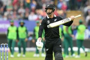 New Zealand's Colin de Grandhomme walks back to the pavilion after being dismissed for 60 in the World Cup match against South Africa. By Oli SCARFF (AFP)