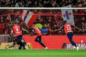 Nicolas Pepe converted a penalty for Lille to score his fifth goal of the season.  By PHILIPPE HUGUEN (AFP)