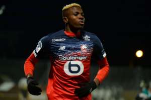 Nigerian forward Victor Osimhen celebrated after scoring for Lille at Angers but was later injured. By JEAN-FRANCOIS MONIER (AFP/File)