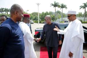 Nigerian President Muhammadu Buhari (right) held crisis talks in Abuja on January 9, where regional leaders discussed the political situation in Gambia