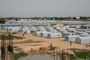 Nigeria's brutal 10-year insurgency has seen hundreds of thousands of displaced people flood into camps in Maiduguri to escape rural violence. By FATI ABUBAKAR (AFP/File)