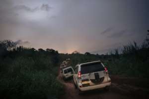 Nightfall: The convoy returns to Bunia after making its pitch for peace. By ALEXIS HUGUET (AFP)