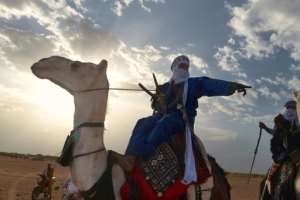 Nomads converge on the oasis town of Ingall to mark the end of the rainy season. By Michele Cattani (AFP)