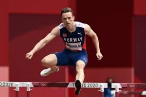Norway's Karsten Warholm competes in the men's 400m hurdles heats. By Jewel SAMAD (AFP)