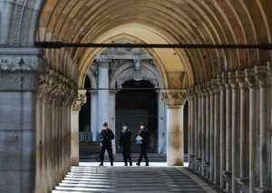 Officers patrol the streets of Venice, which saw some stringent lockdown measures eased this week. By ANDREA PATTARO (S fornasier/AFP)
